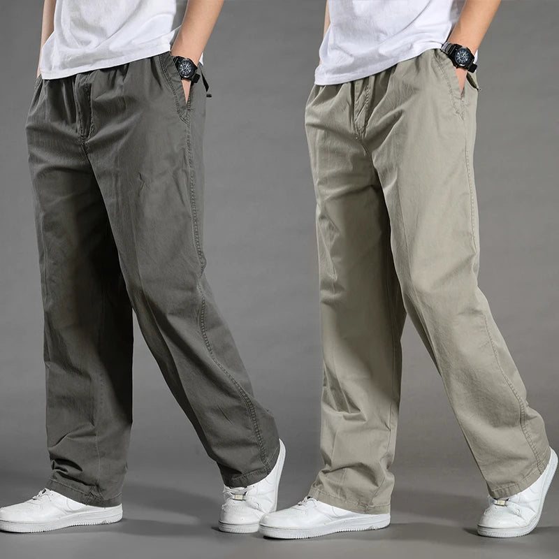 Two pairs of pants shown side by side on a gray background