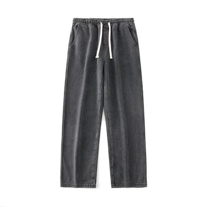 Gray sweatpants with a drawstring on a white background