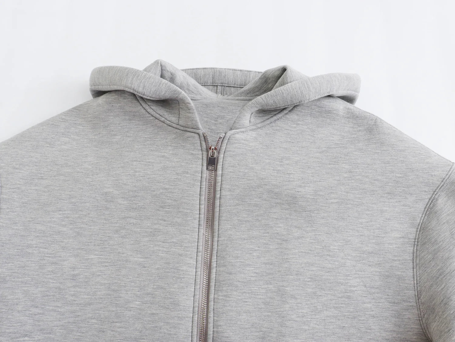 Gray zip-up hoodie on a light gray background