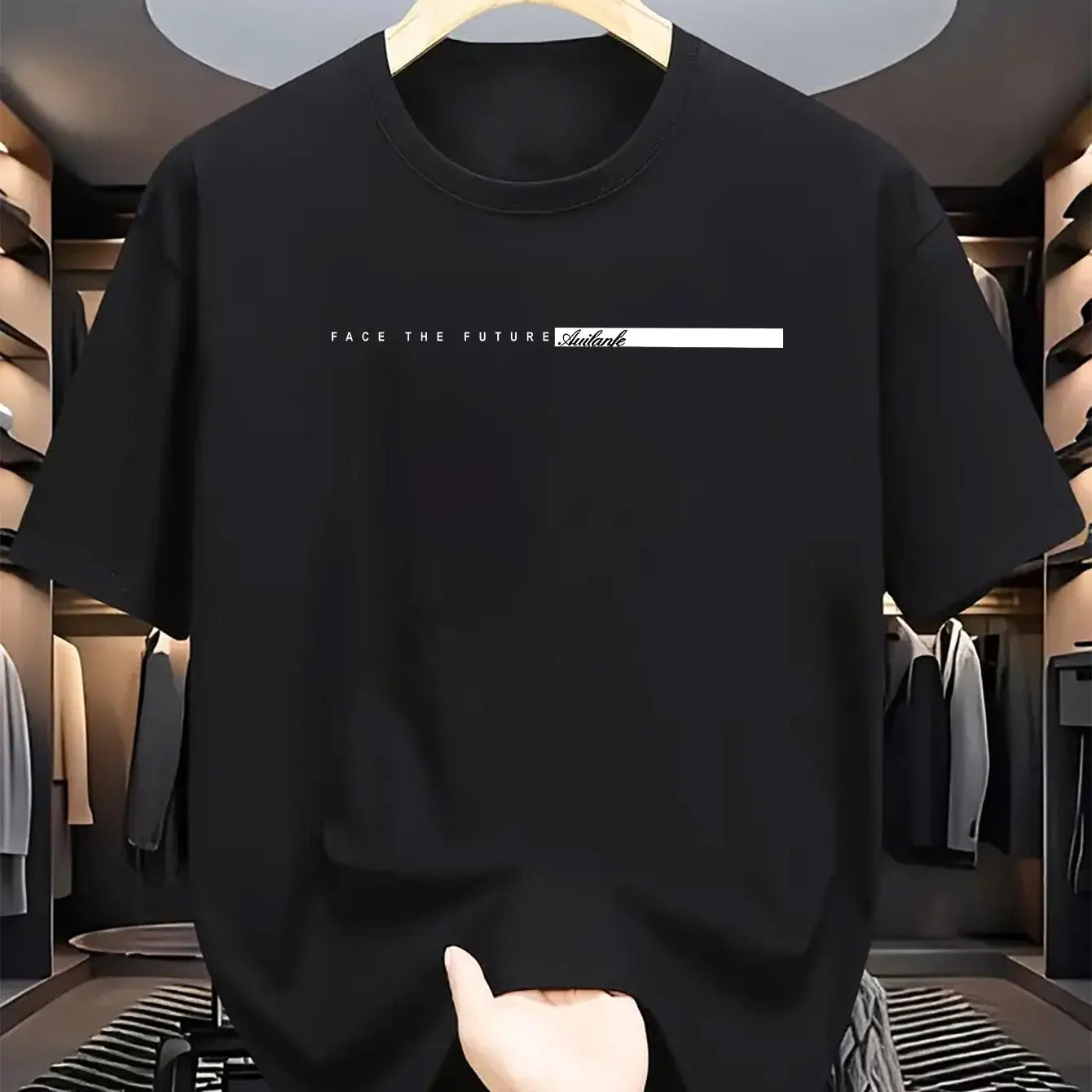 Black t-shirt with text on a hanger in a clothing store.