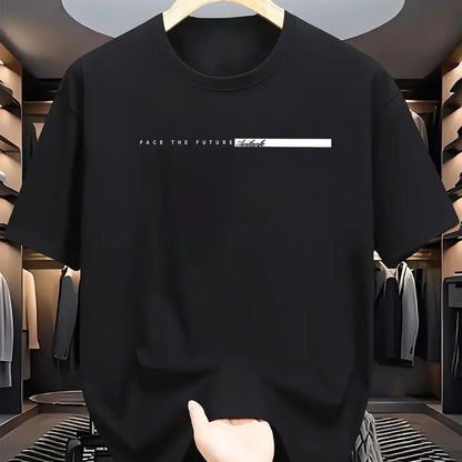 Black t-shirt with text on a hanger in a clothing store.