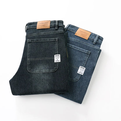 Two pairs of jeans, one black and one blue, on a white background