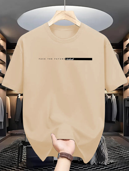 Beige t-shirt with text on a hanger in a clothing store.