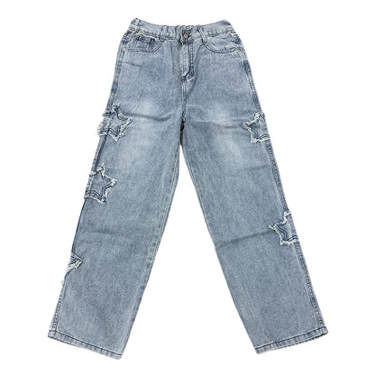 Light blue jeans with distressed details on a white background