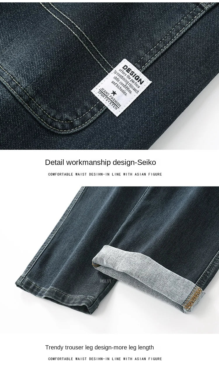Close-up of dark blue denim jeans with a brand label on a white background