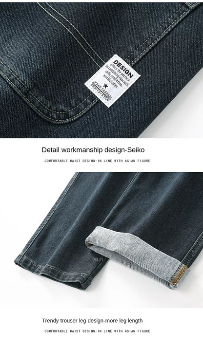Close-up of dark blue denim jeans with a brand label on a white background