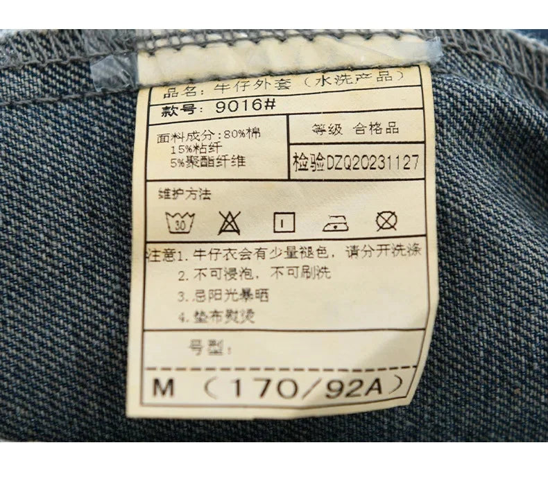 Fabric label on denim fabric with text and symbols