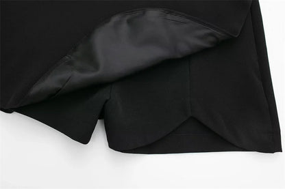 Black fabric with a satin lining on a white background