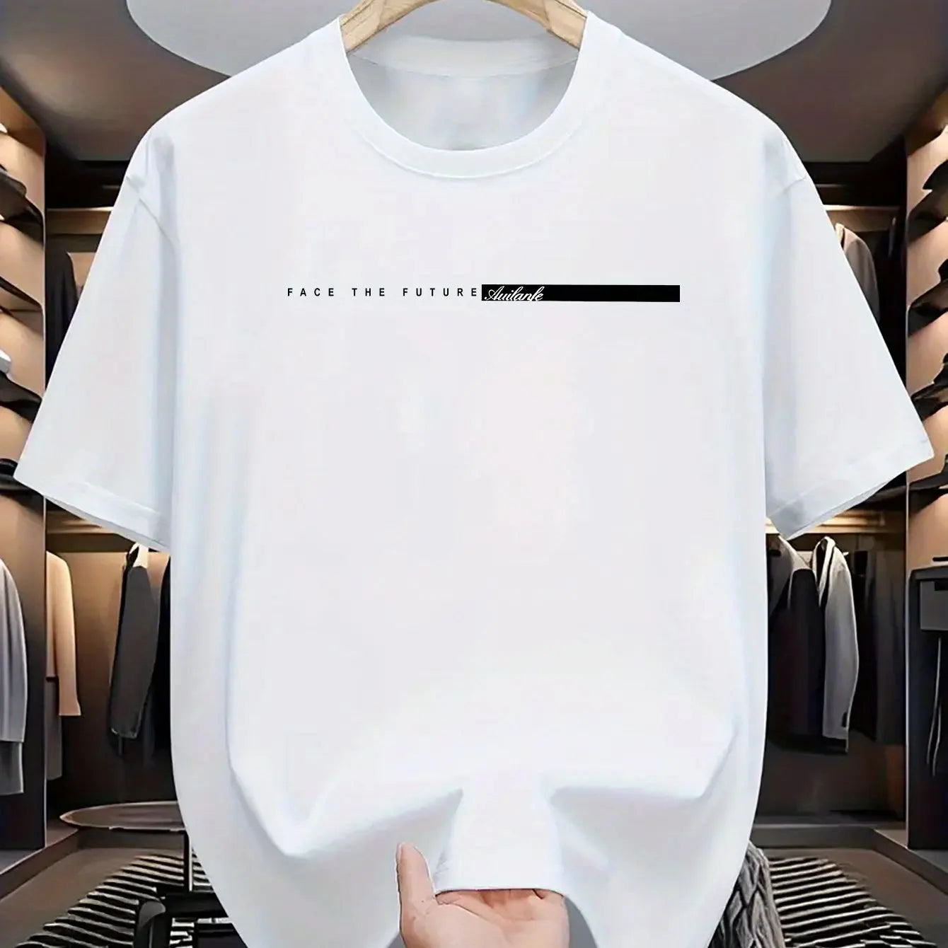 White t-shirt with text on a hanger in a clothing store.