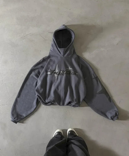 Gray hoodie on a concrete floor