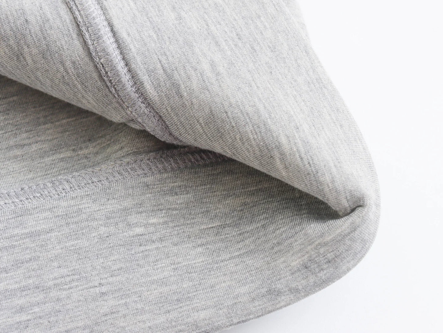 Close-up of gray fabric with a white background