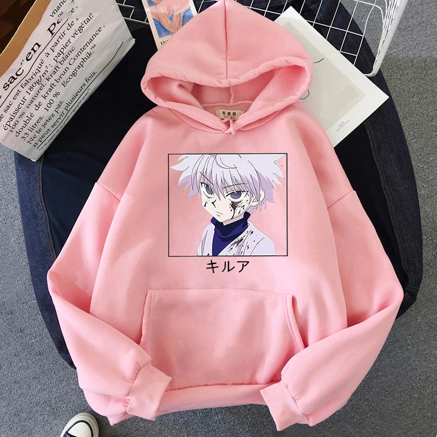 Pink hoodie with anime character graphic on a surface